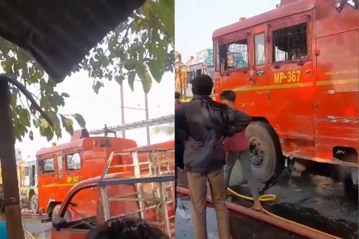 पश्चिम बंगाल के उत्तर 24 परगना जिले में चलती ट्रक में भड़की भीषण आग, स्थानीय लोगों में फैली दहशत 13 Bongaon Truck Fire: पाट से भरी चलती ट्रक में लगी भीषण आग, लाखों का नुकसान